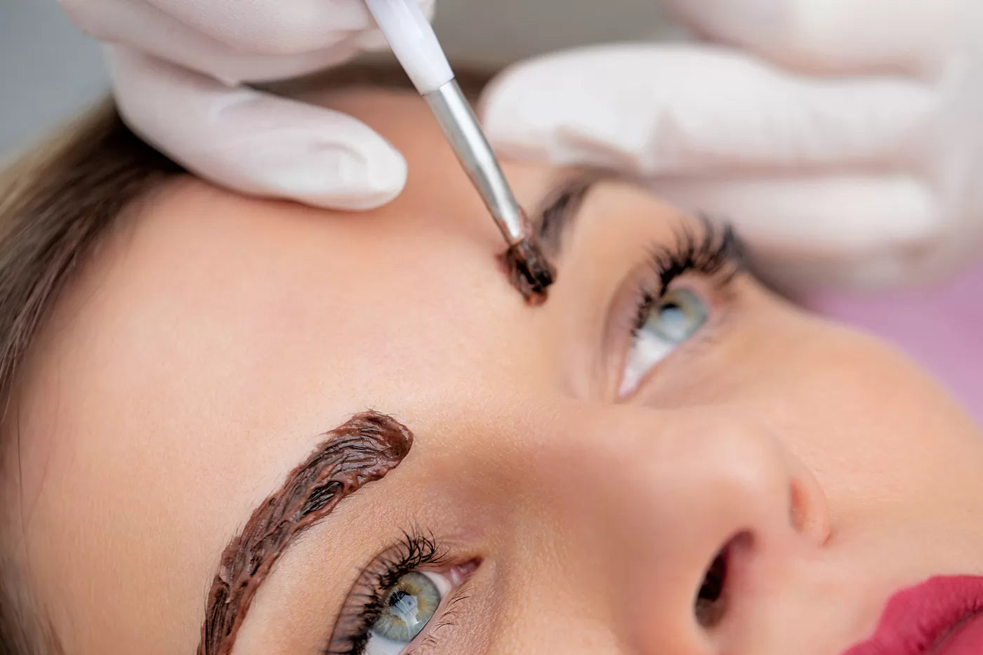 a model having her brows tinted using our range of brow tints