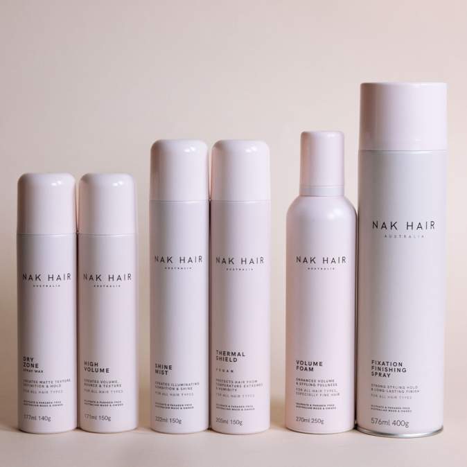 An image of NAK volume Range of six bottles from thier NAK volume and styling range