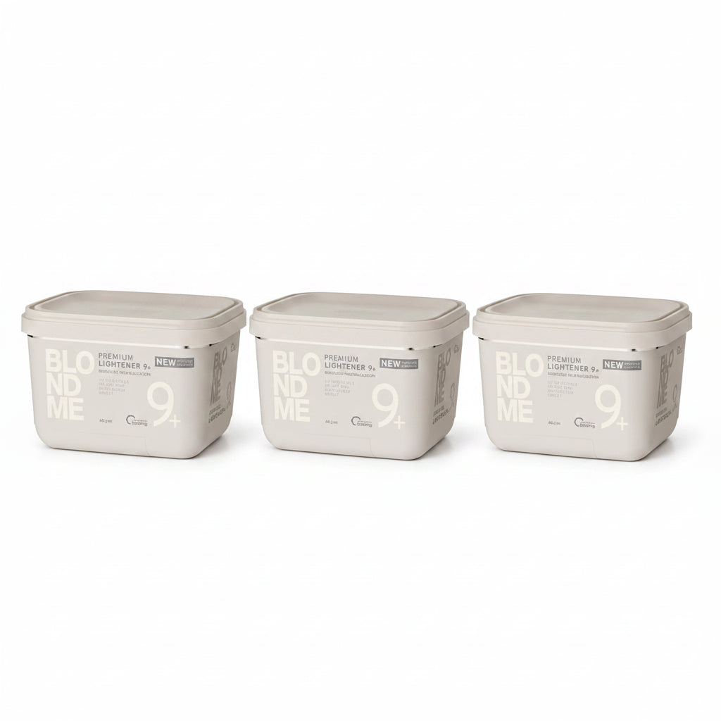 Three rectangular plastic containers of BLOOM ME 9+ Premium Lightener in a light beige color, arranged side-by-side on a white background.