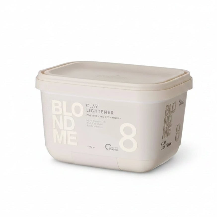A rectangular plastic tub of BlondMe Clay Lightener in shade 8, shown on a plain white background.