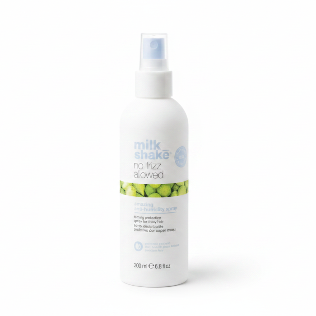 Milk Shake anti humidity hair product spray bottle on a white background