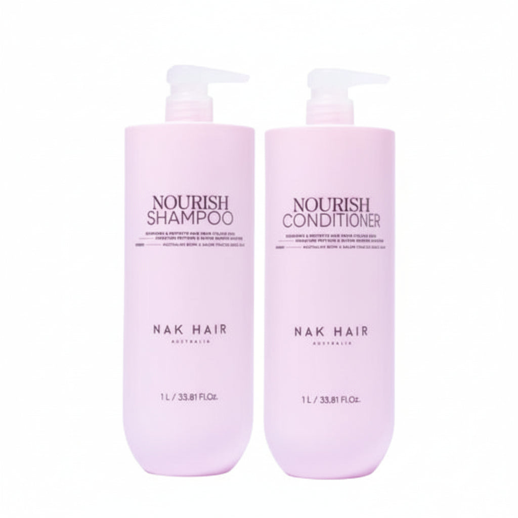 Two bottles of NAK Hair Nourish Shampoo and Conditioner on a white background