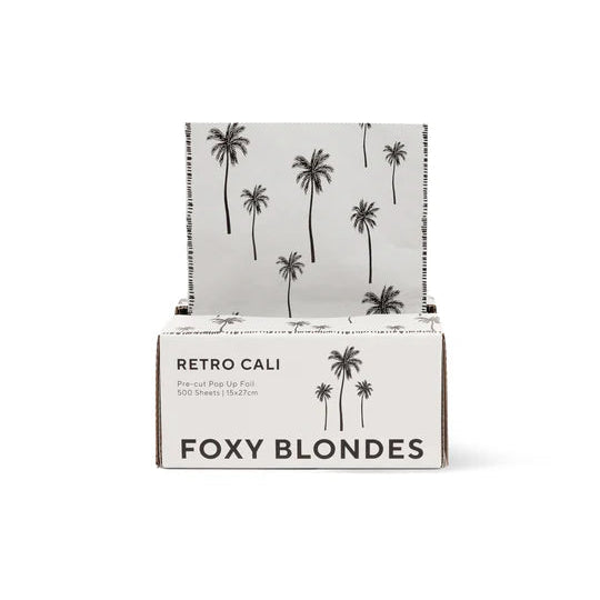 Foxy Blondes product packaging with palm tree design on a white background