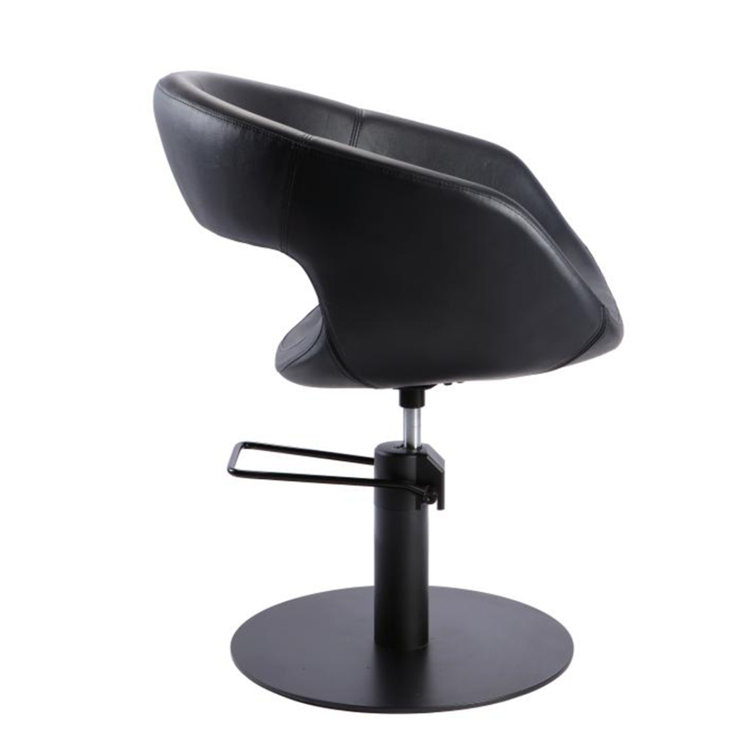 Black salon chair with adjustable height on a white background