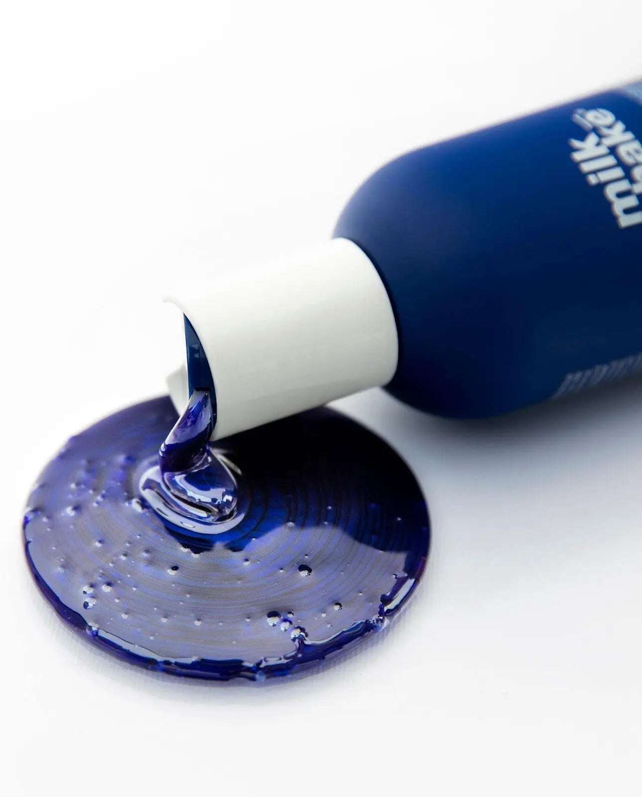 a professional-grade toning shampoo specially crafted to neutralize unwanted warm, orange, or red tones in dark hair